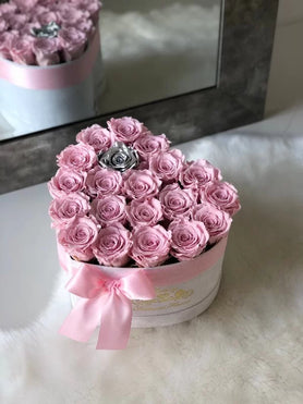 silver and pink preserved roses